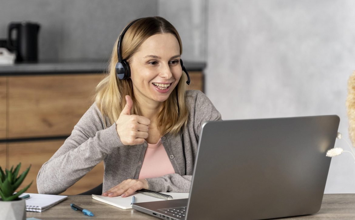 woman-with-headset-working-laptop (1)