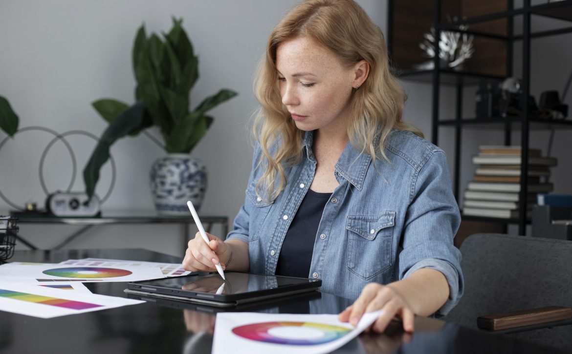 young-female-logo-designer-working-graphic-tablet (1)