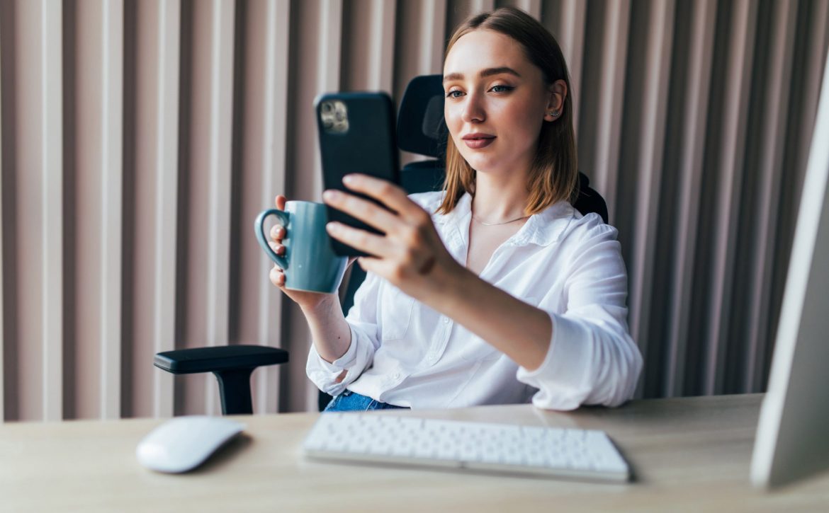 young-pretty-woman-working-line-with-pc-phone-desktop-office (1)